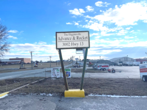 The sign for the Higginsville Advance in front of our old building