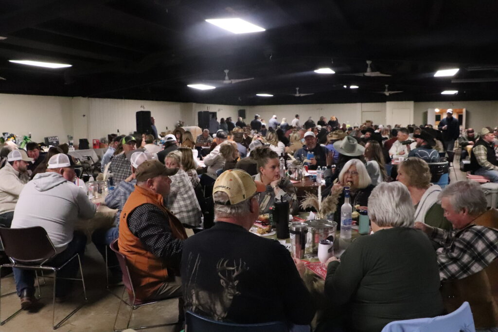 The Waverly Community Building was packed on Saturday night as guests gathered for the Swim Club piccadilly. (Santa Fe Times photo by Klarissa Olvera)